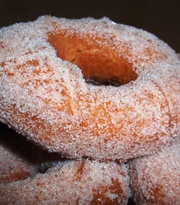 Old Fashioned Gluten-Free Doughnut coated with granulated sugar.
