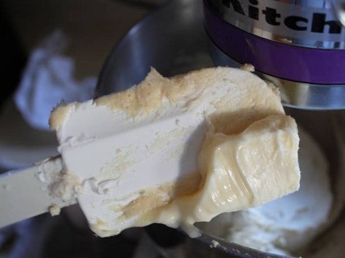 Butter on spatula for gluten-free panettone.