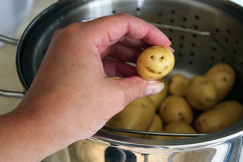 Small potatoes with a smiley face.