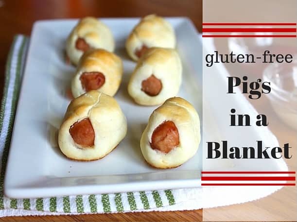 Gluten-free pigs in a blanket on a platter.