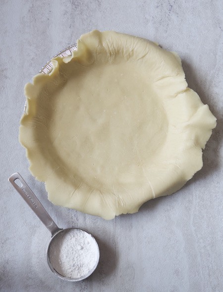 Gluten Free Pie Crust pressed into pan. 