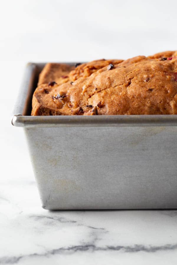 Gluten-free cranberry bread in pan.