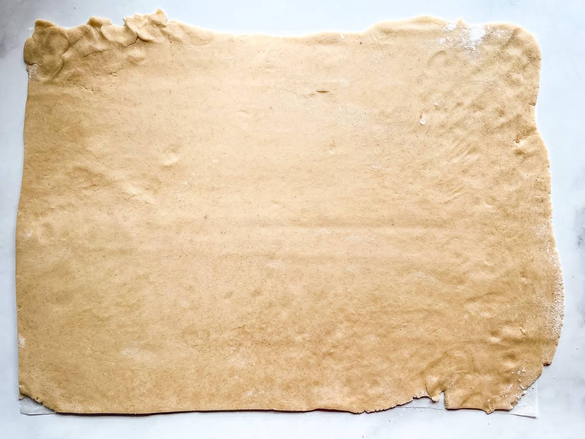 A sheet of gluten-free graham cracker dough.