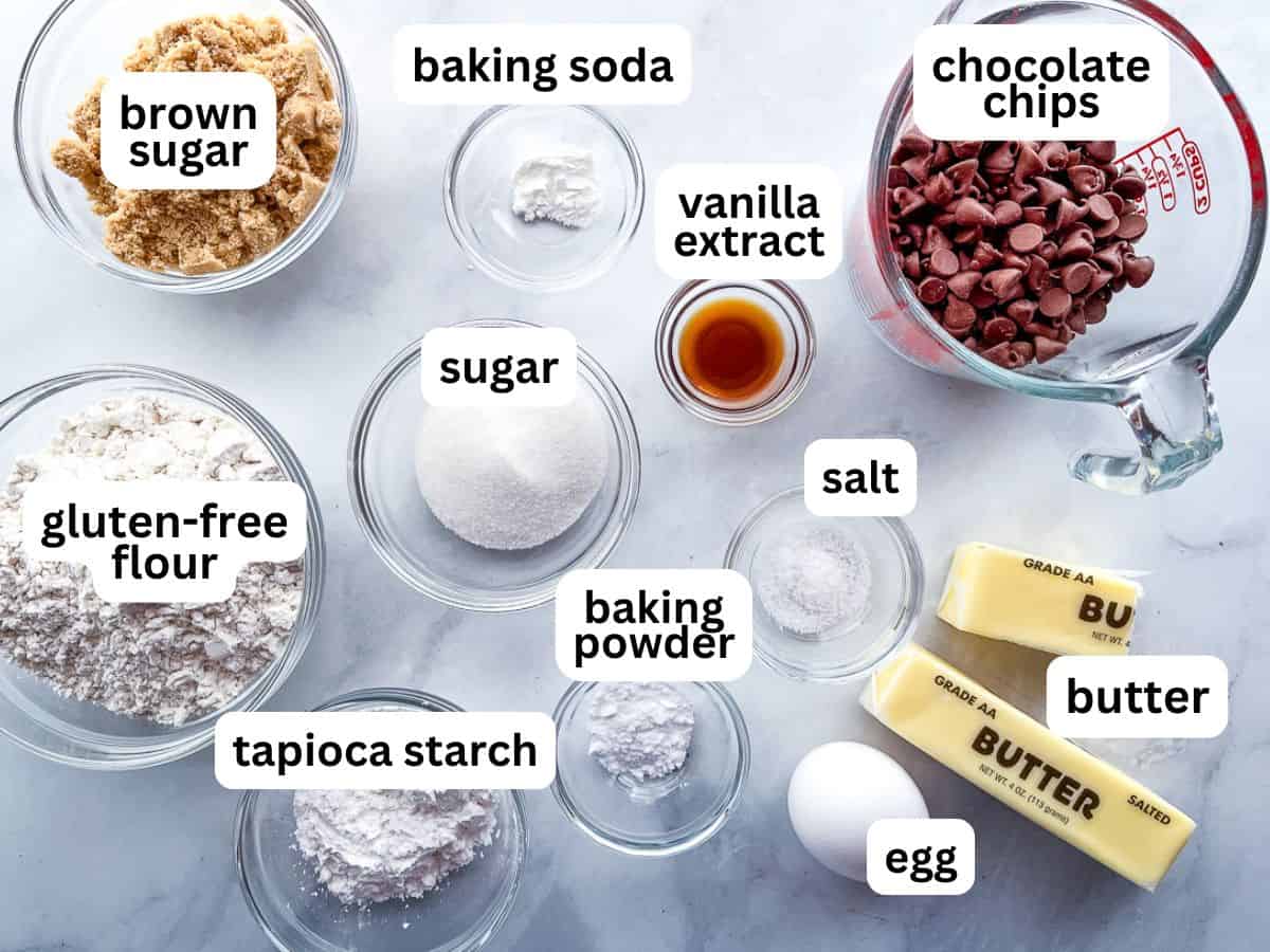 Ingredients for bakery-style gluten-free chocolate chip cookies measured on the counter.